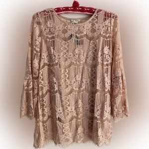 Blush lace top, flared sleeves.